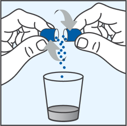 Illustration of 2 hands emptying the contents of a capsule shell containing oral pellets into a mixing cup of liquid.