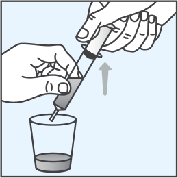 Illustration of the contents of a mixing cup being pulled into a syringe.